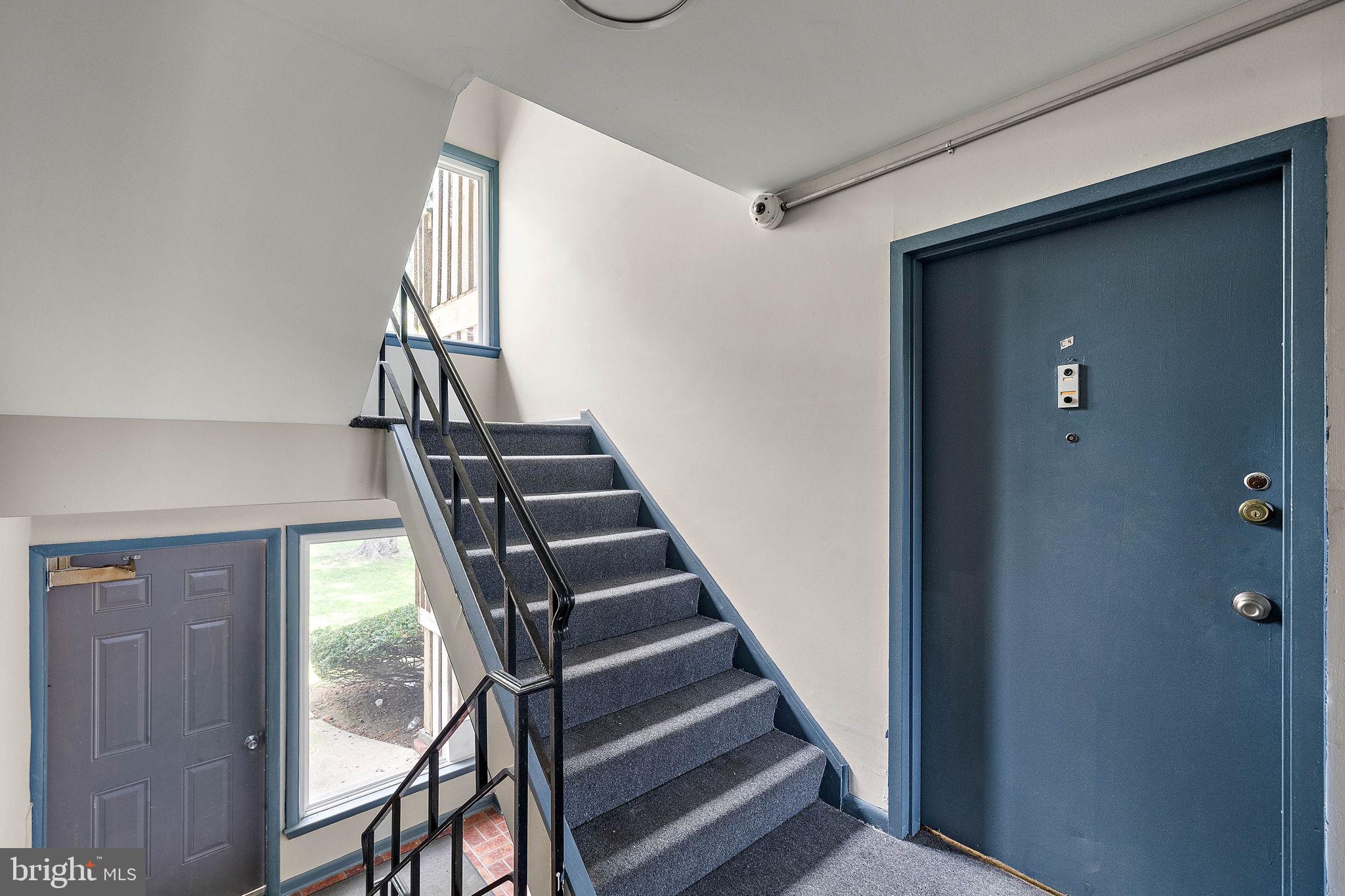 200 Brandywine Boulevard, Unit C7 Wilmington, DE 19803 - Photo 13 of 16 a view of entryway and hall with wooden floor
