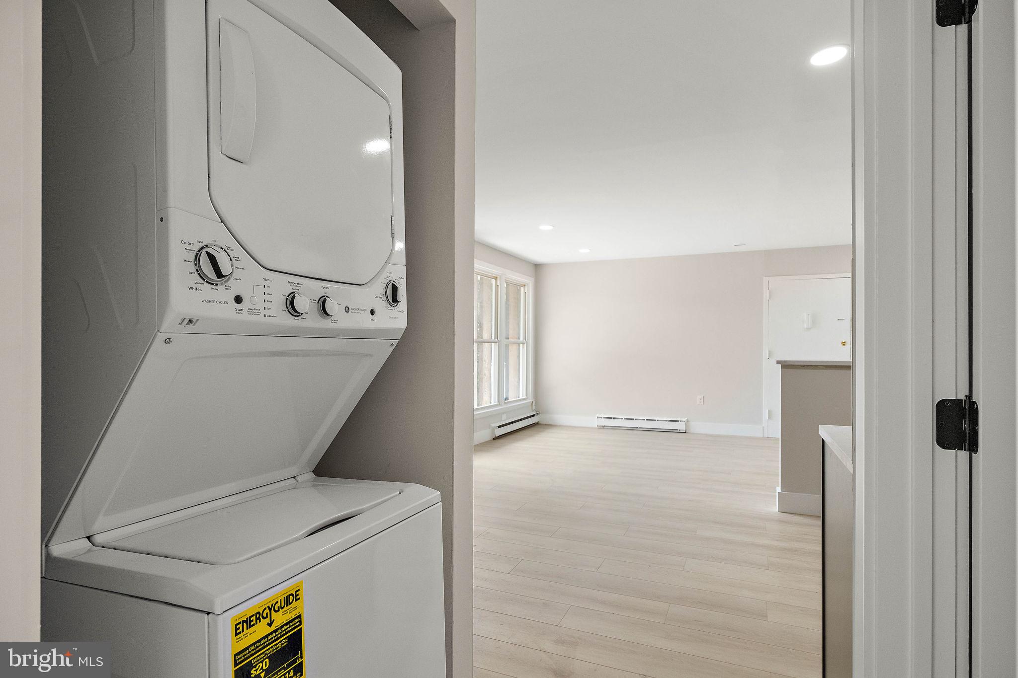 200 Brandywine Boulevard, Unit C7 Wilmington, DE 19803 - Photo 10 of 16 a utility room with dryer and washer