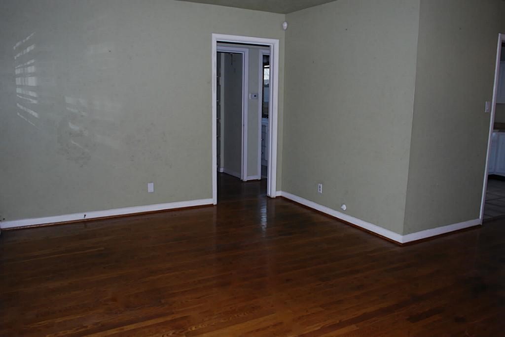 6611 Housman Houston, TX 77055 - Photo 3 of 17 Family room view to hall leading to 3 bedrooms