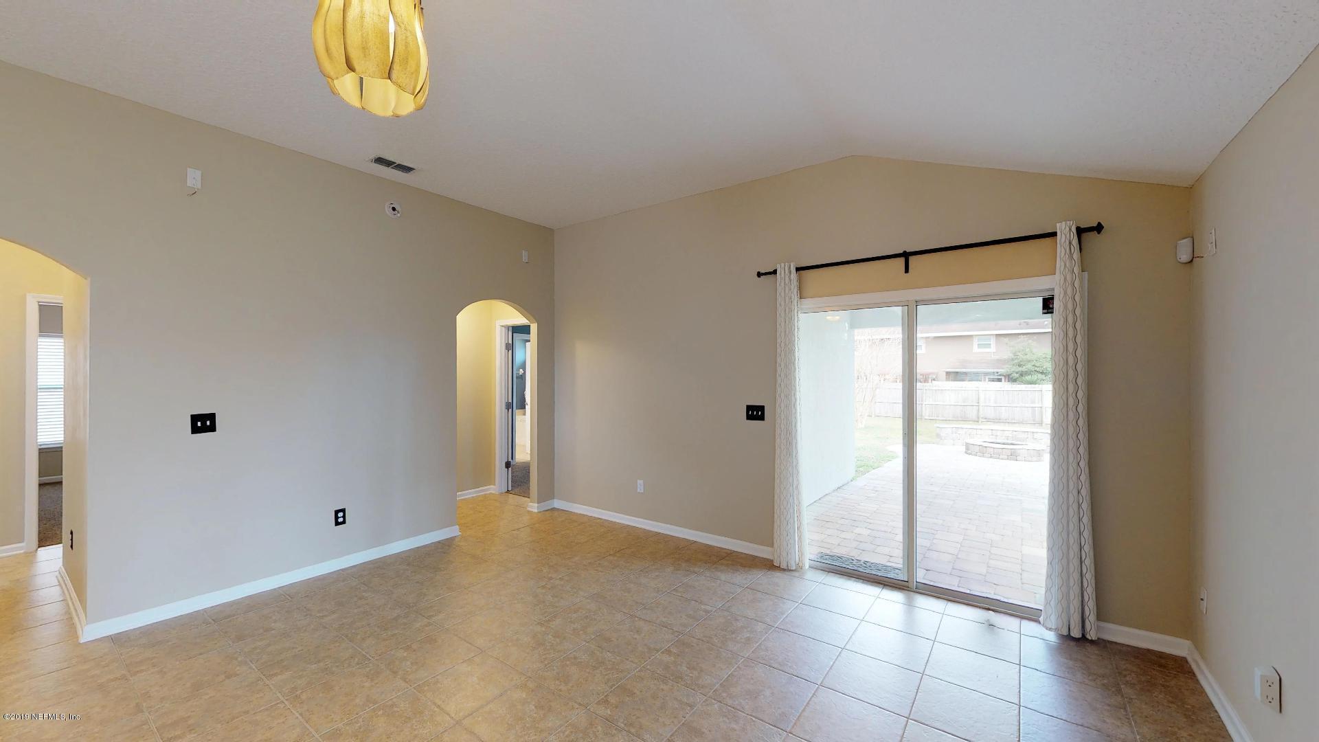 1919 Derringer Road Jacksonville, FL 32225 - Photo 18 of 42 a view of a room with a window