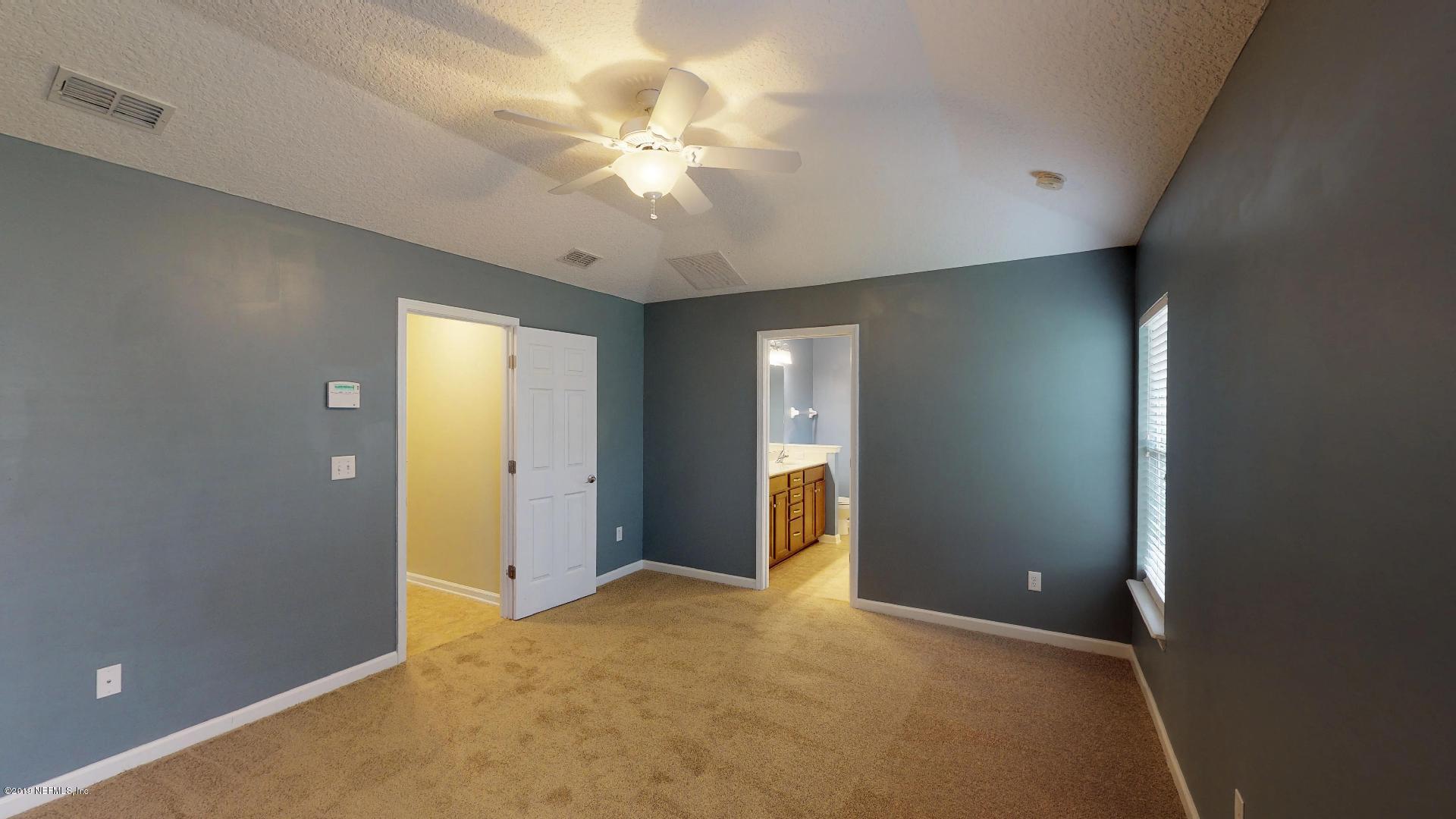 1919 Derringer Road Jacksonville, FL 32225 - Photo 20 of 42 an empty room with a bathroom