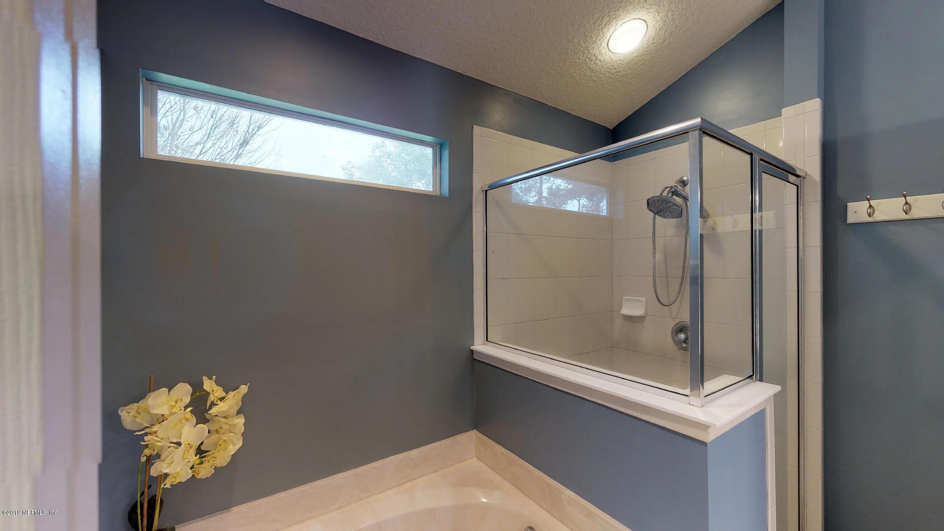 1919 Derringer Road Jacksonville, FL 32225 - Photo 25 of 42 a bathroom with a shower