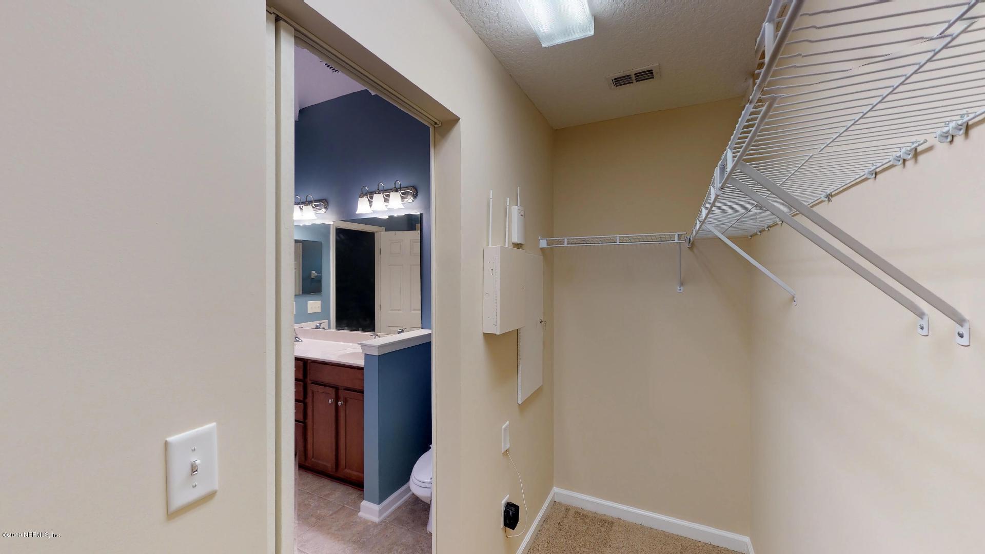1919 Derringer Road Jacksonville, FL 32225 - Photo 27 of 42 a view of walk in closet