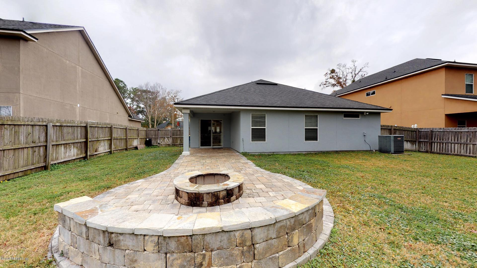 1919 Derringer Road Jacksonville, FL 32225 - Photo 36 of 42 a house view with a garden space