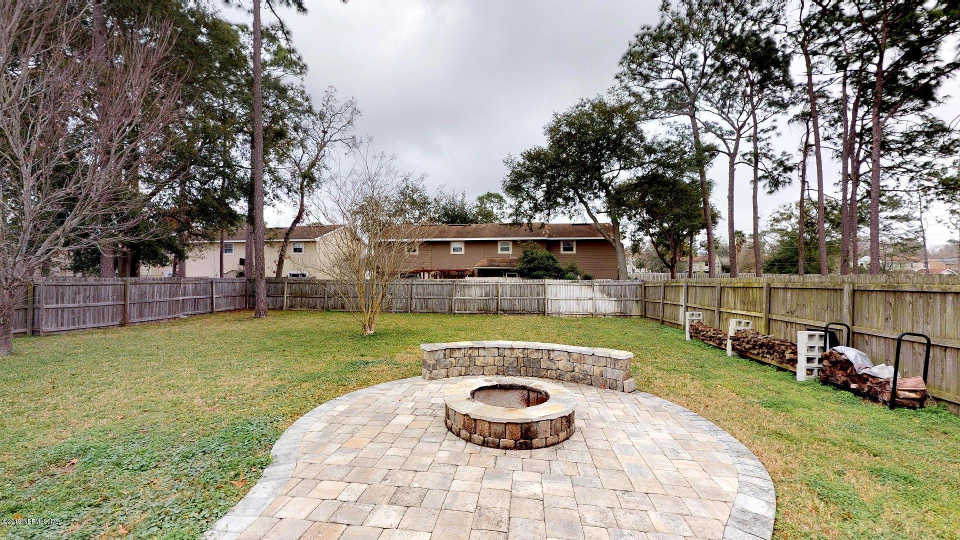 1919 Derringer Road Jacksonville, FL 32225 - Photo 37 of 42 a view of a backyard with swimming pool