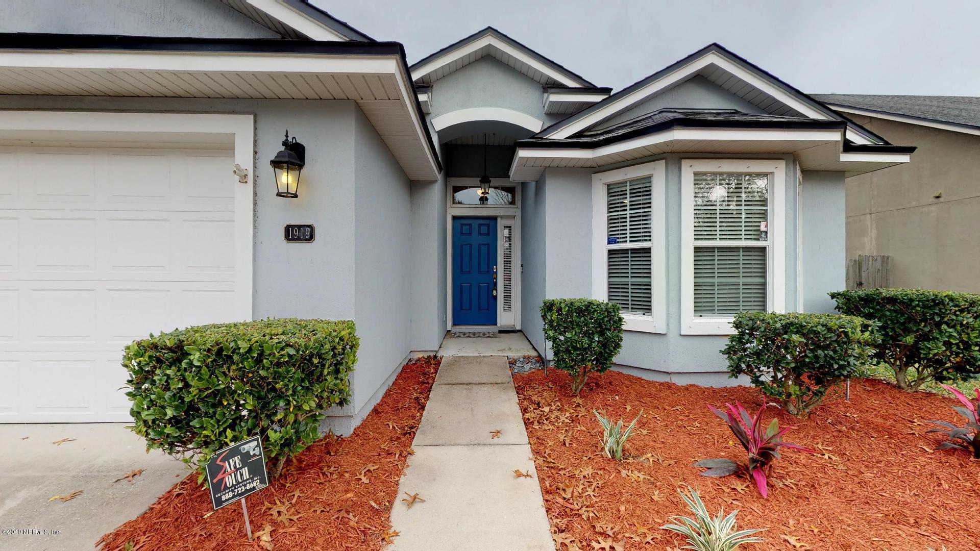 1919 Derringer Road Jacksonville, FL 32225 - Photo 4 of 42 a front view of a house with garden