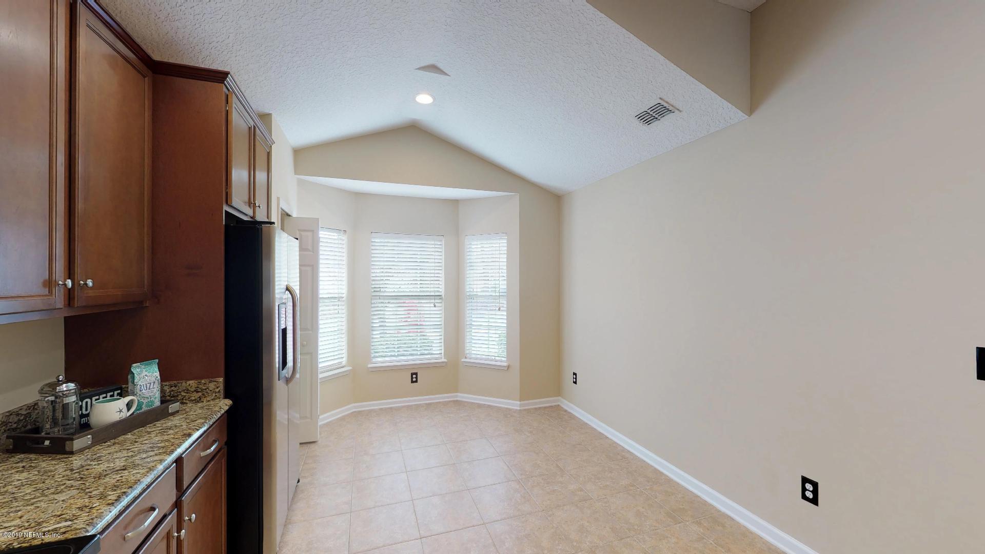 1919 Derringer Road Jacksonville, FL 32225 - Photo 9 of 42 a view of a kitchen cabinets and a kitchen