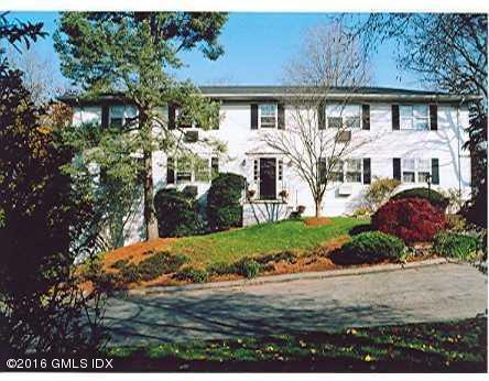 49 Valley Road, Unit C1 Cos Cob, CT 06807 - Photo 1 of 1 a front view of a house with garden