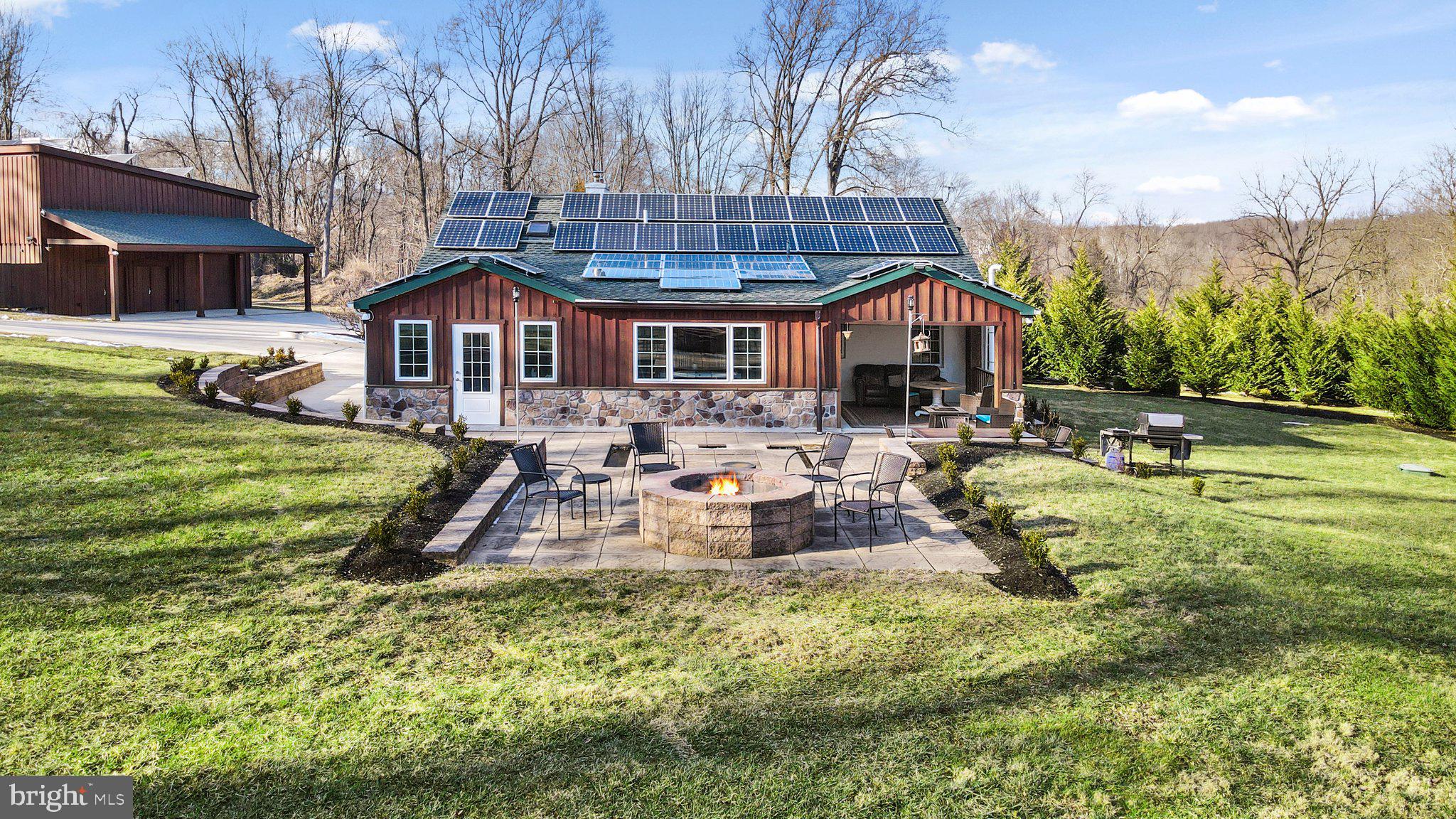 920 Horseshoe Pike Downingtown, PA 19335 - Photo 1 of 76 Rear, fire pit, waterfall to koi pond