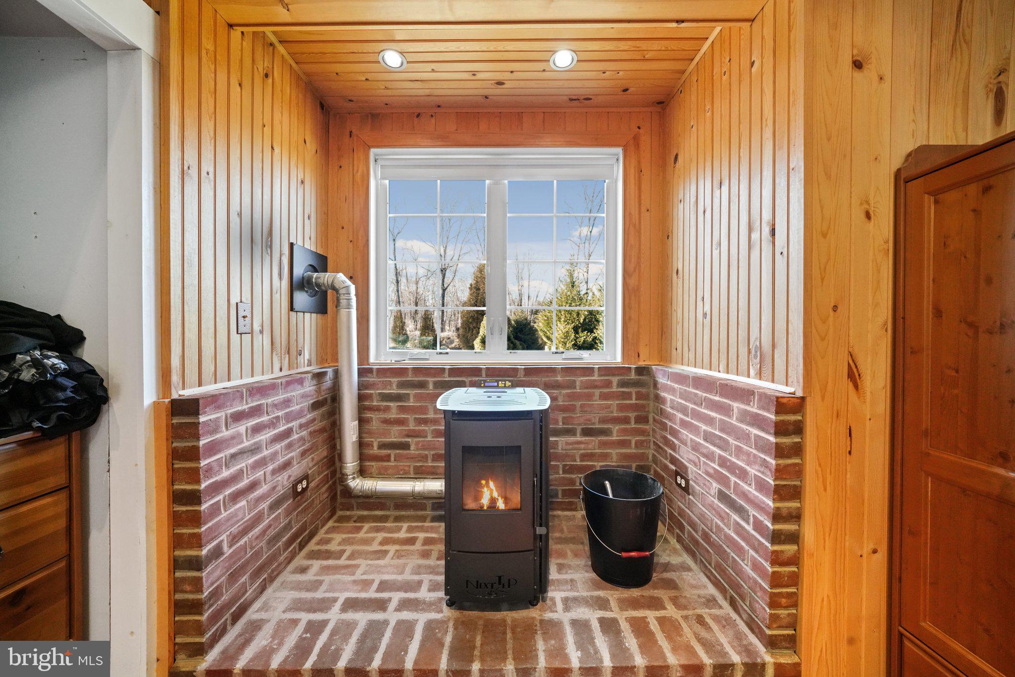 920 Horseshoe Pike Downingtown, PA 19335 - Photo 16 of 76 Pellet stove in owners' suite (main floor)