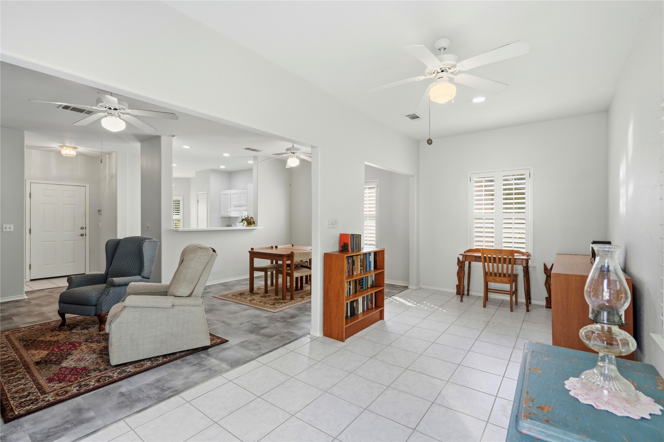 117 Whitewing Way Georgetown, TX 78633 - Photo 12 of 27 This living area features tile flooring, with a dining space, and kitchen access for effortless entertaining.