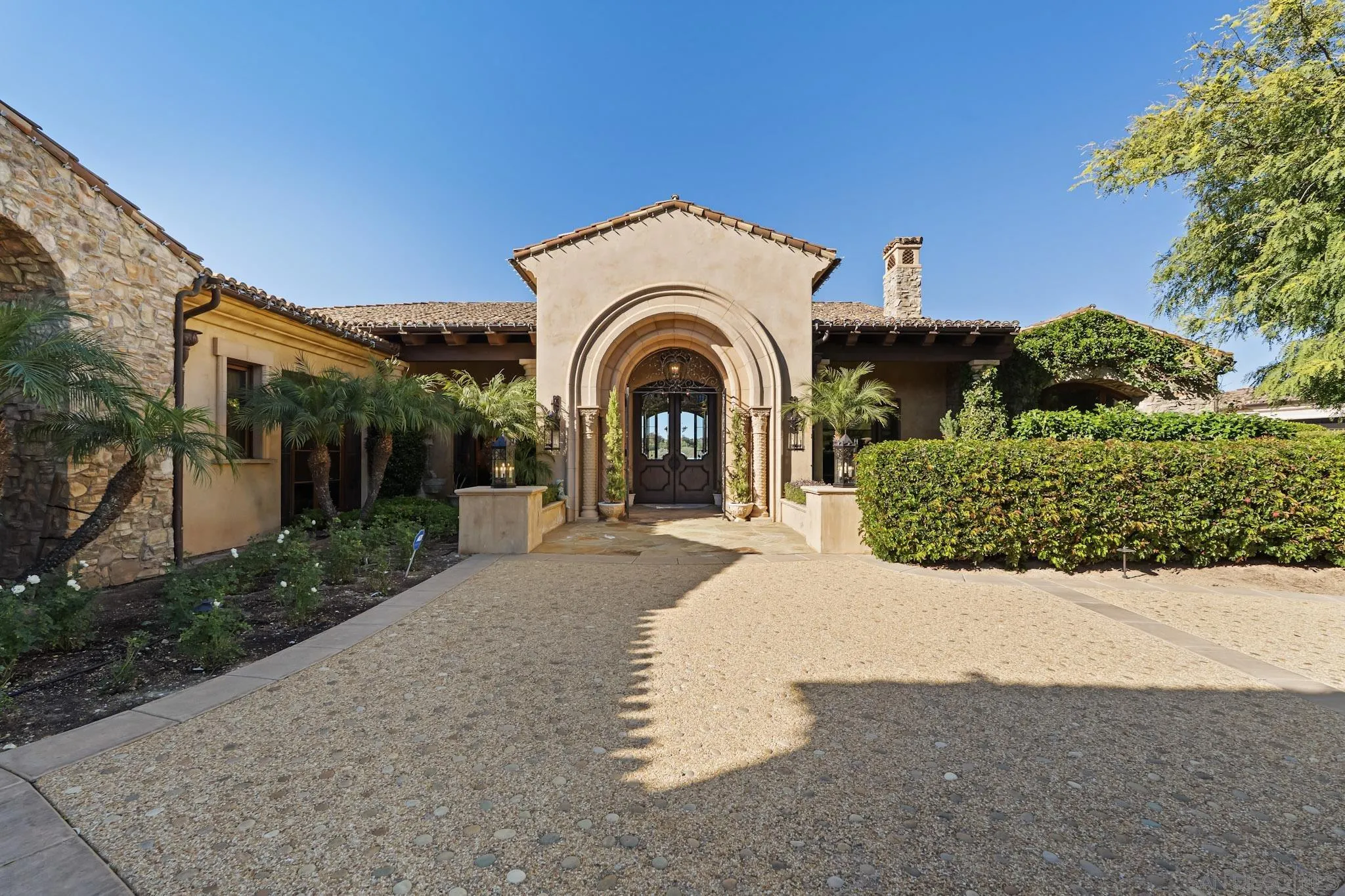18486 Via Candela Rancho Santa Fe, CA 92091 - Photo 2 of 34 a view of a house with a yard