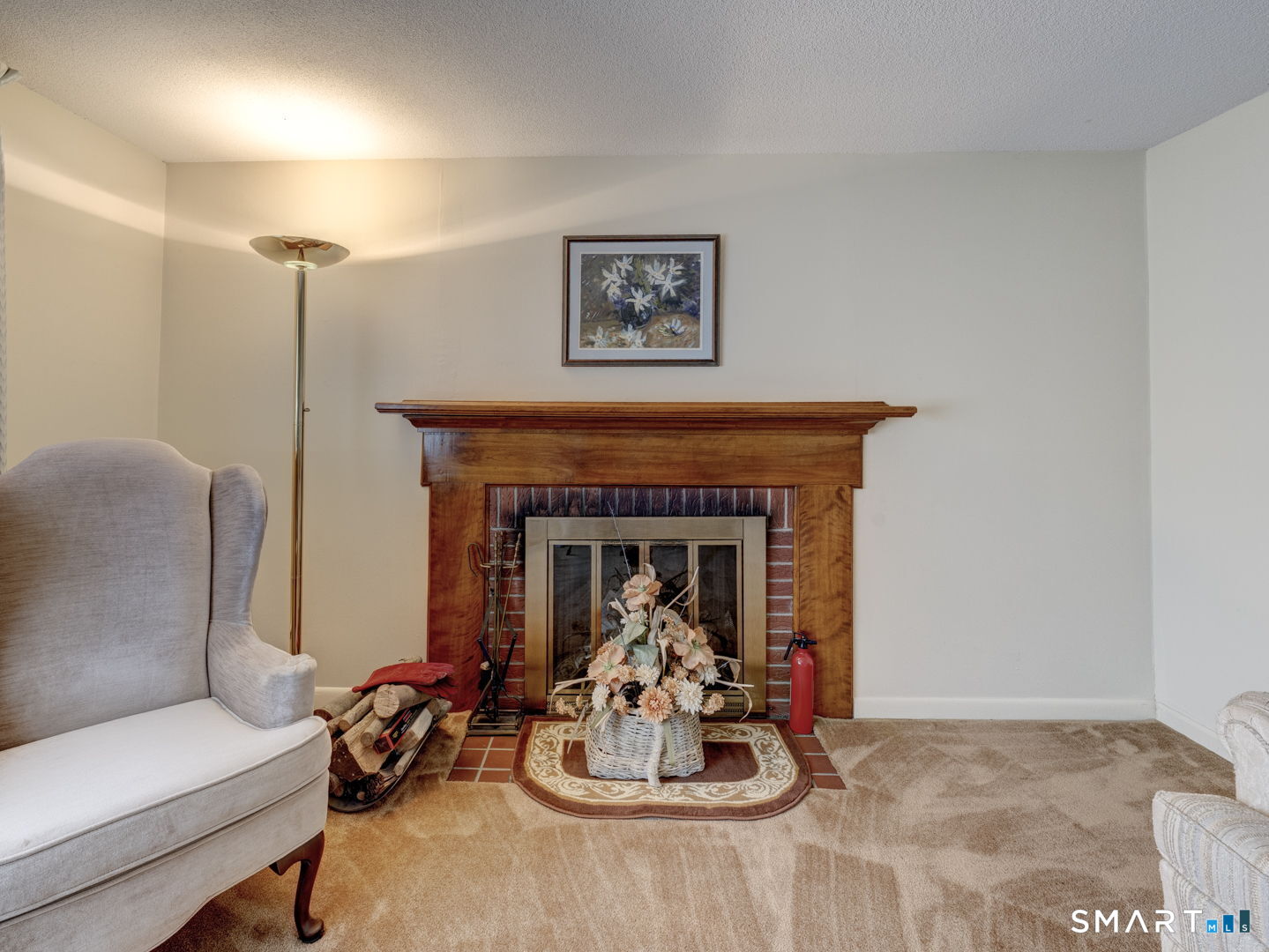 53 Goodwin Drive Somers, CT 06071 - Photo 5 of 22 a living room with furniture and a fireplace