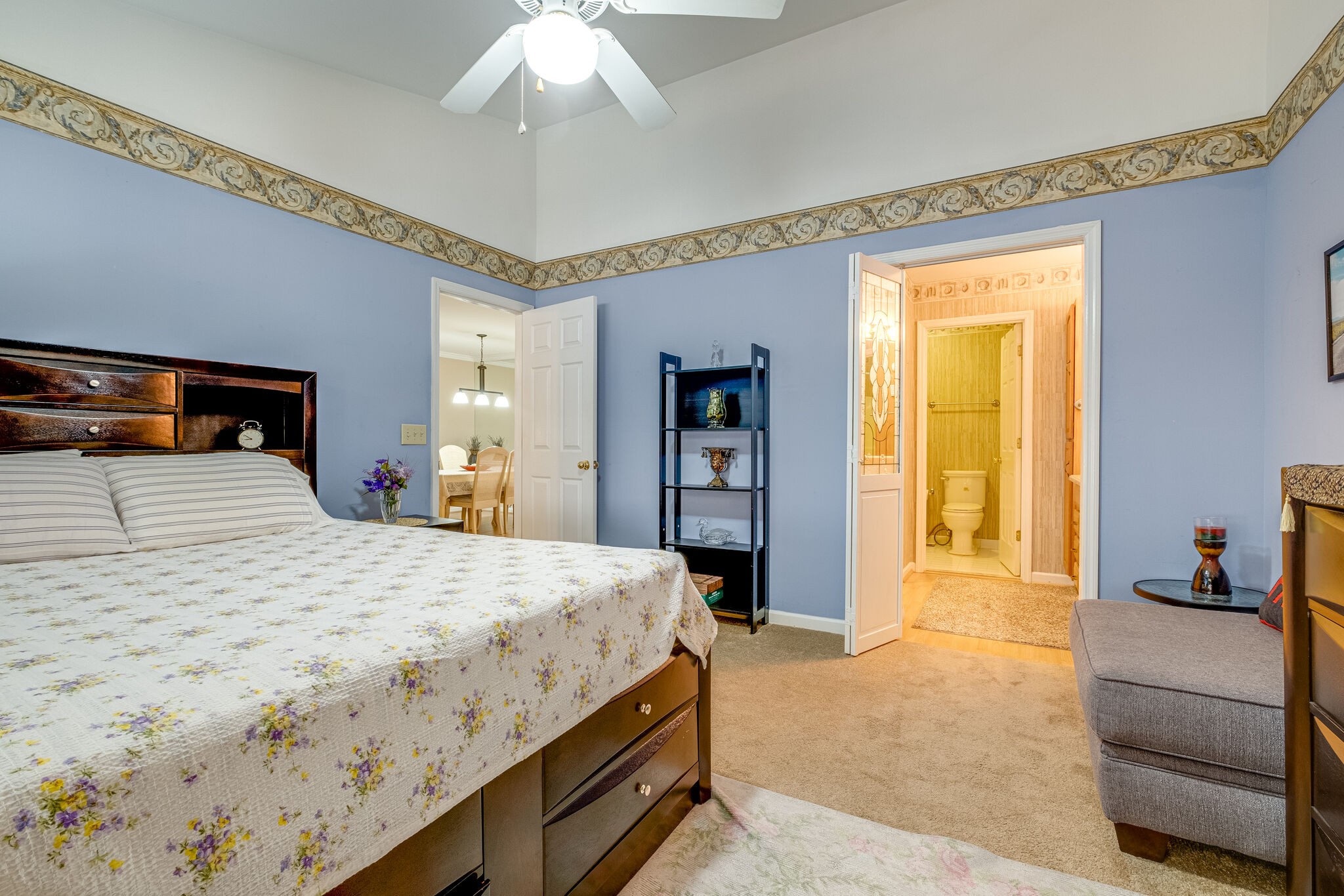 86 Pepper Ridge Circle, Unit 86 Antioch, TN 37013 - Photo 15 of 29 a bedroom with a bed and a dresser