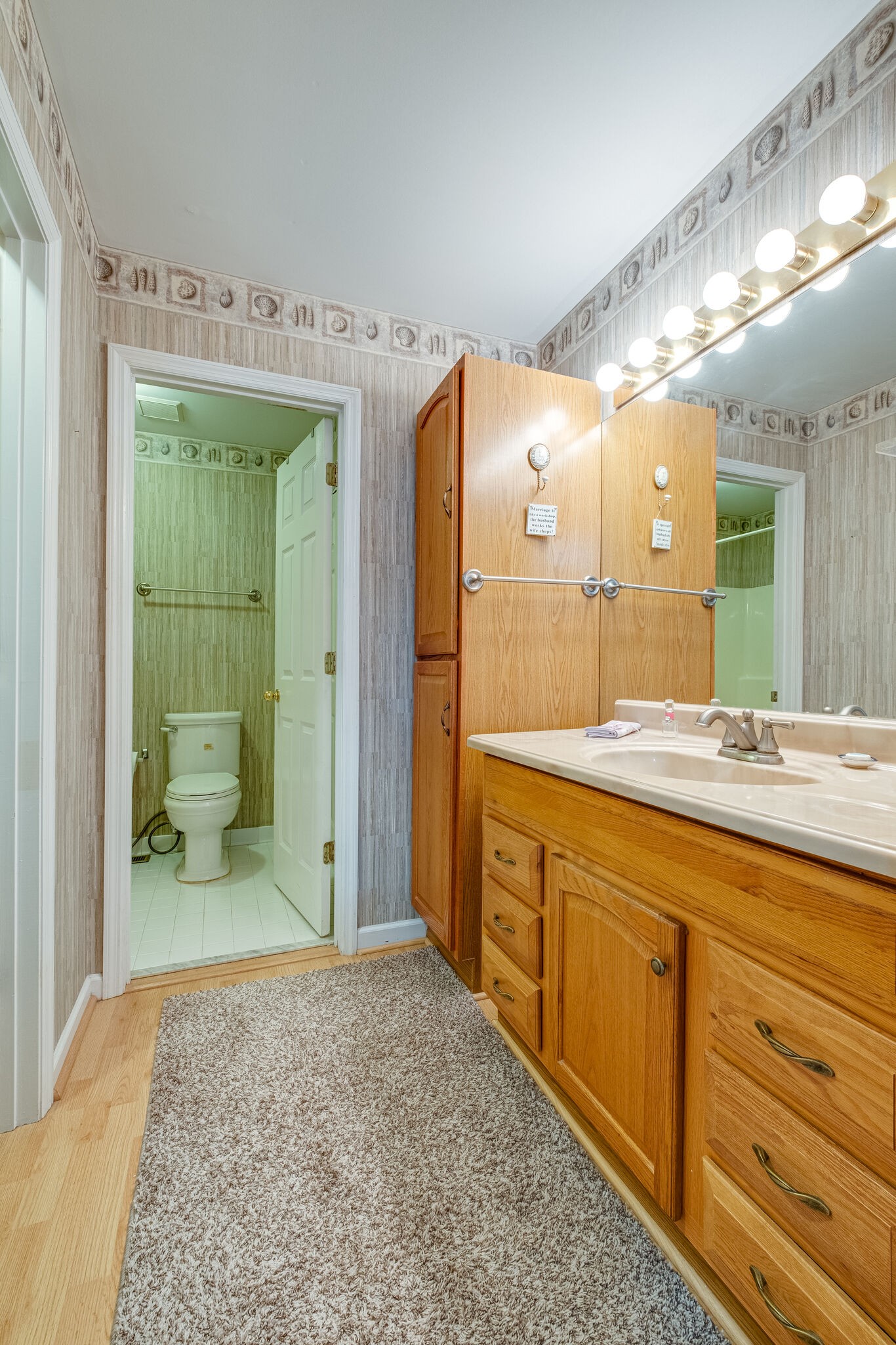 86 Pepper Ridge Circle, Unit 86 Antioch, TN 37013 - Photo 16 of 29 a spacious bathroom with a granite countertop sink and a mirror