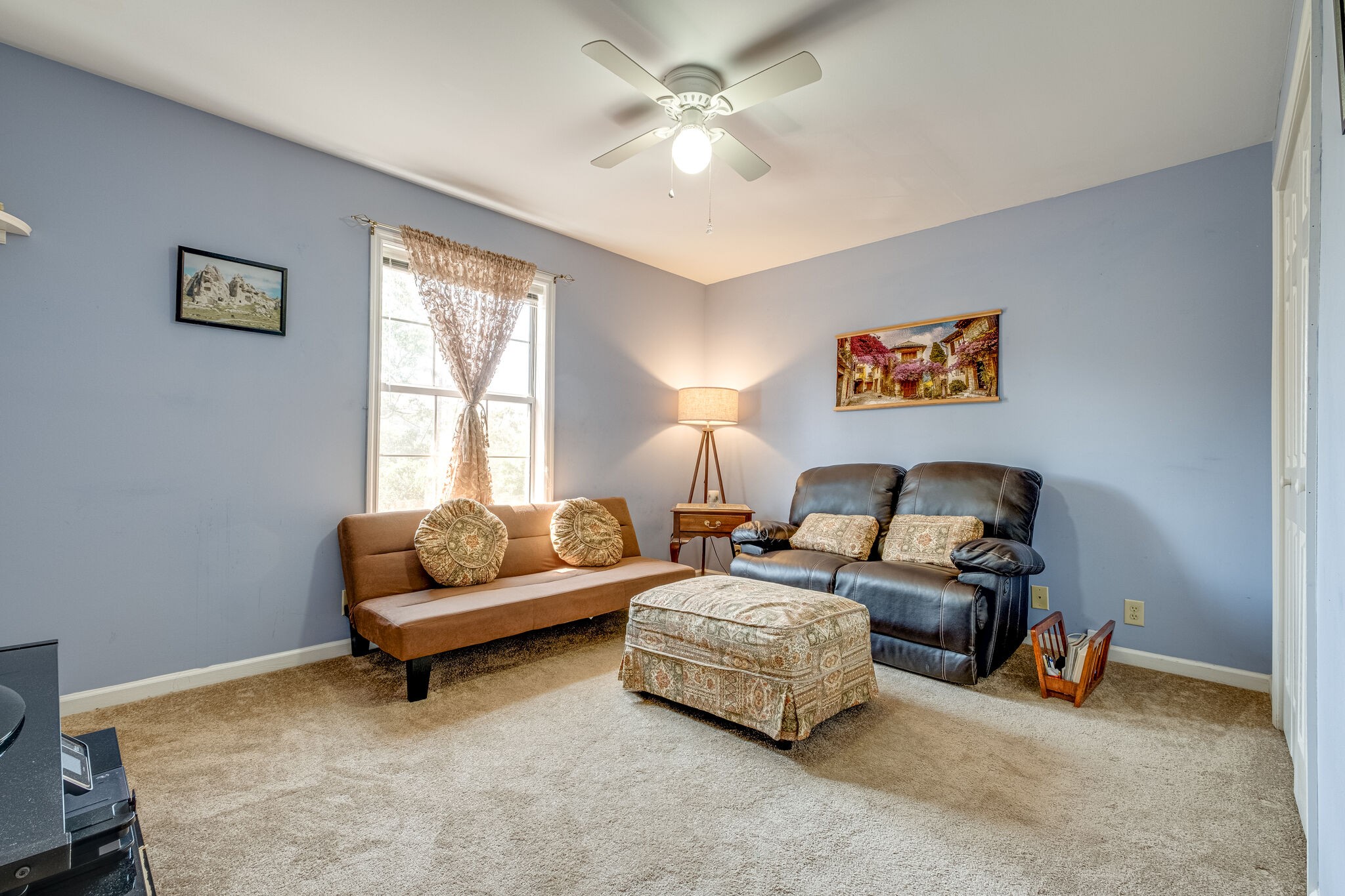 86 Pepper Ridge Circle, Unit 86 Antioch, TN 37013 - Photo 18 of 29 a bedroom with bed and a couch