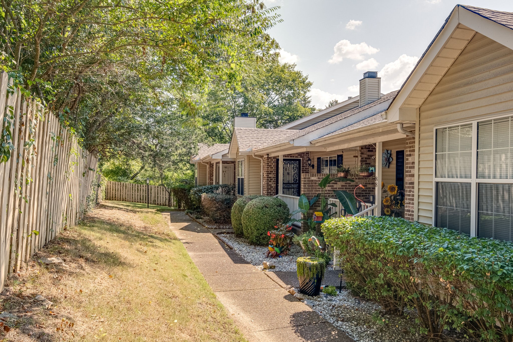86 Pepper Ridge Circle, Unit 86 Antioch, TN 37013 - Photo 2 of 29 a front view of a house with garden