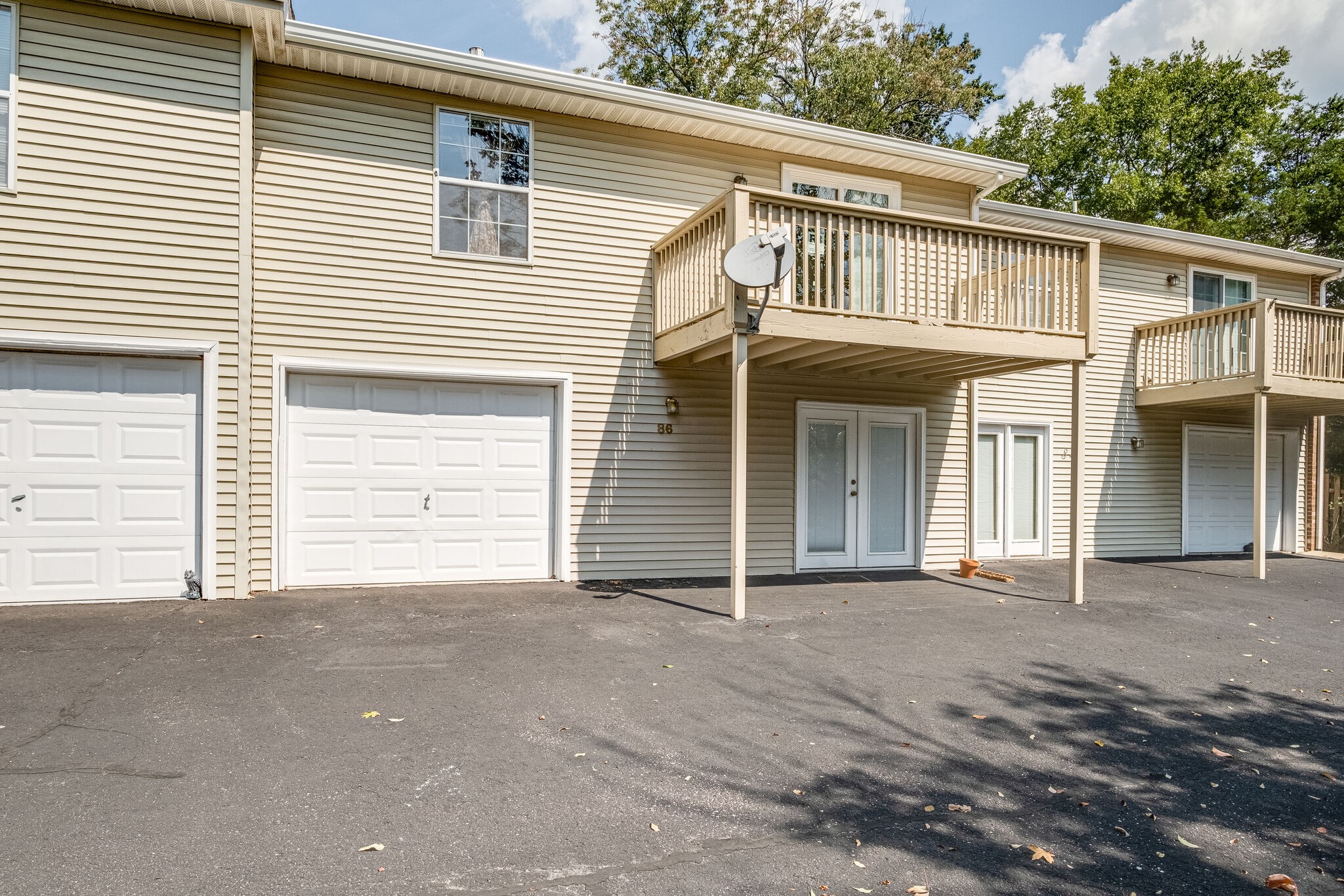 86 Pepper Ridge Circle, Unit 86 Antioch, TN 37013 - Photo 24 of 29 a front view of a house with a garage