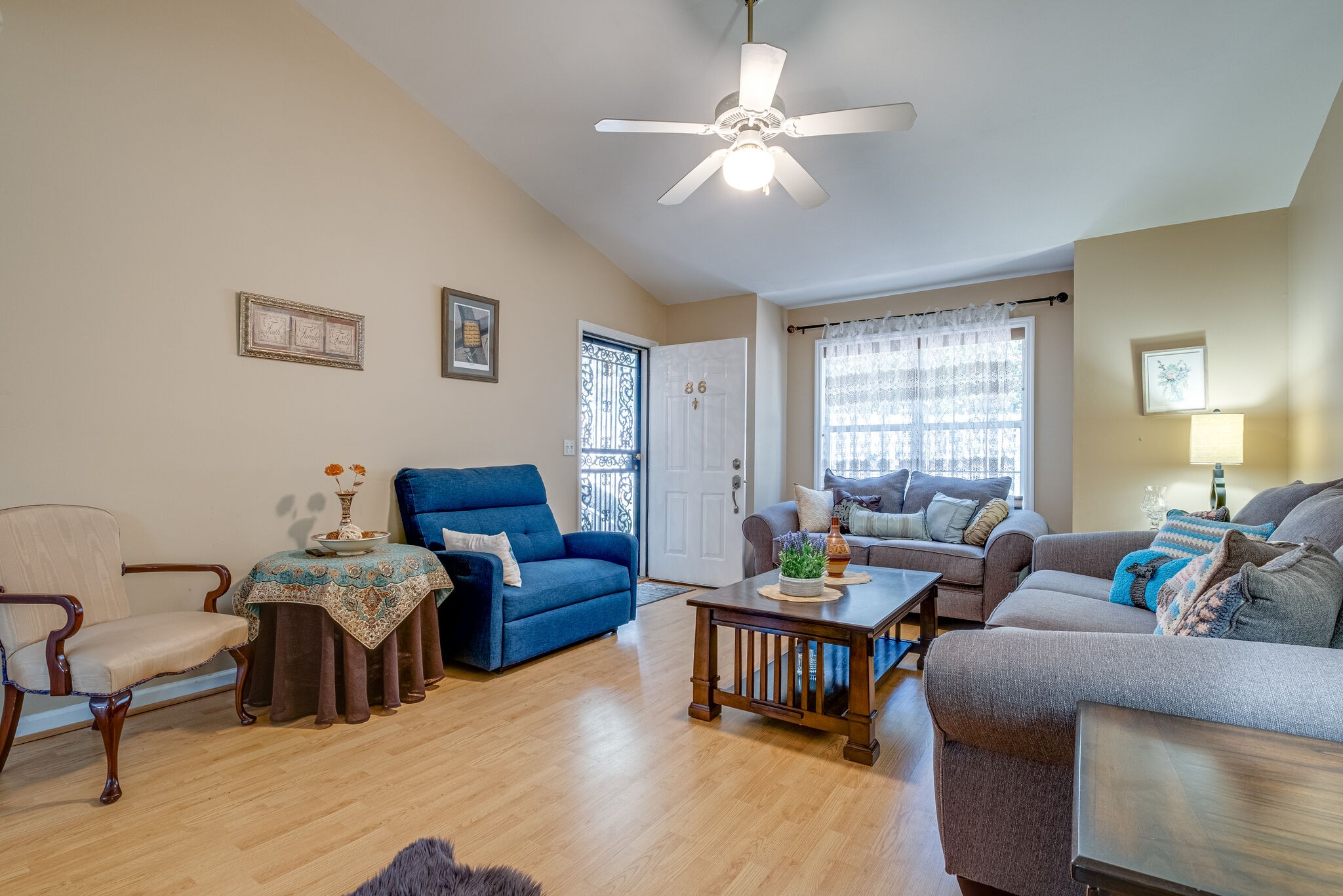 86 Pepper Ridge Circle, Unit 86 Antioch, TN 37013 - Photo 4 of 29 a living room with furniture and a window