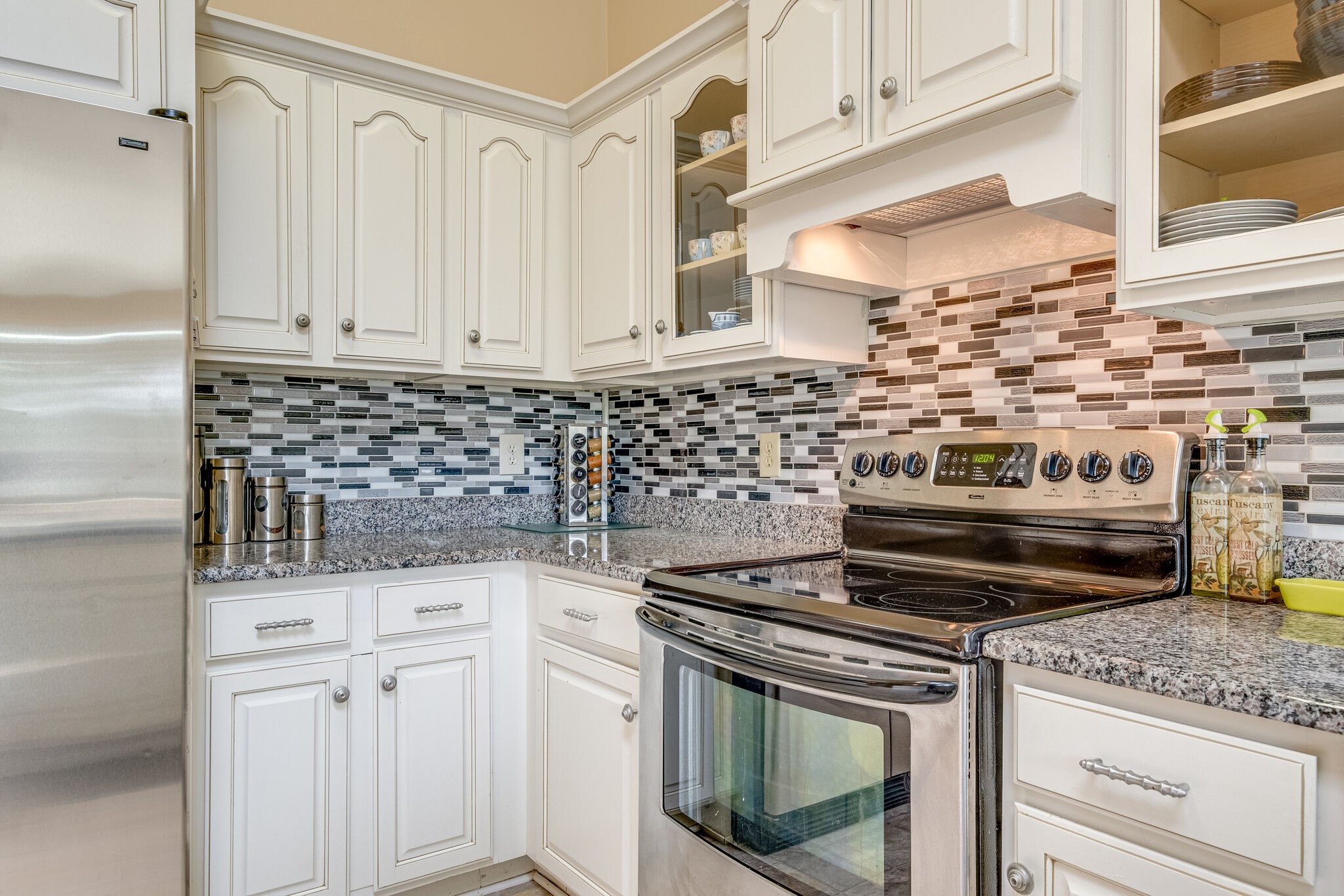 86 Pepper Ridge Circle, Unit 86 Antioch, TN 37013 - Photo 10 of 29 a kitchen with white cabinets and appliances