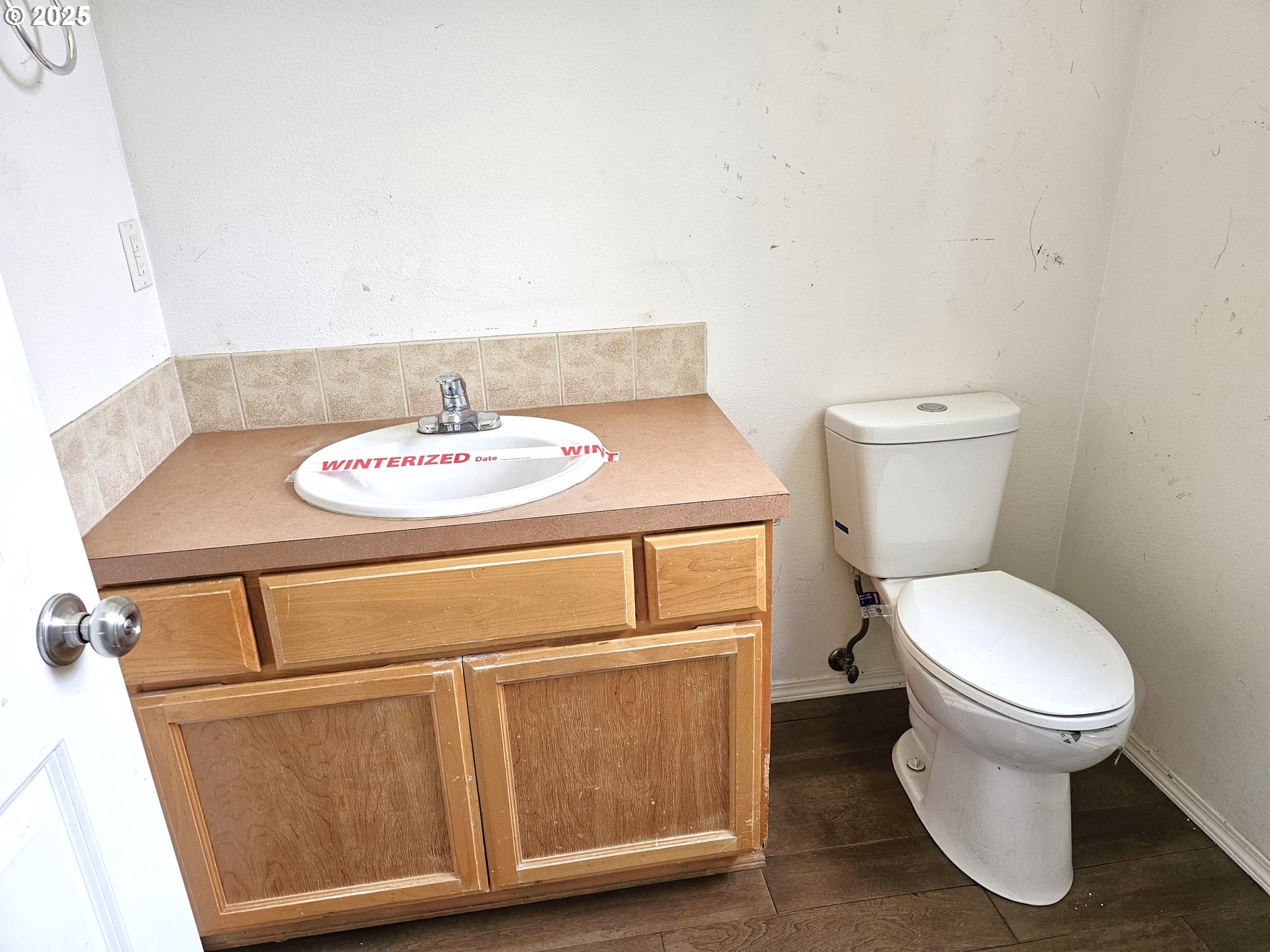 111 Northeast 149th Place Portland, OR 97230 - Photo 7 of 11 a bathroom with a toilet sink and mirror