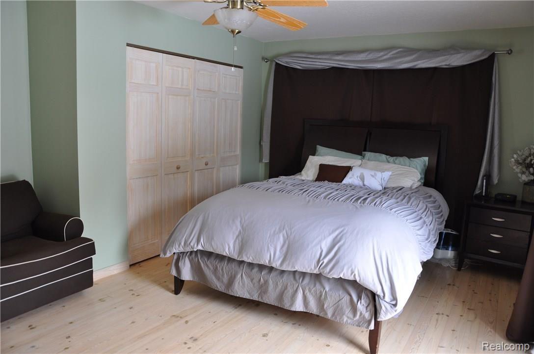 1342 Turrill Road Lapeer, MI 48446 - Photo 13 of 22 Master bedroom has large window & slider