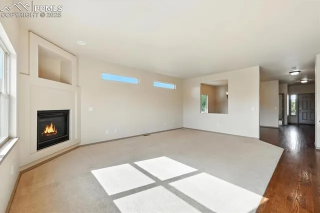 a view of a livingroom with a fireplace