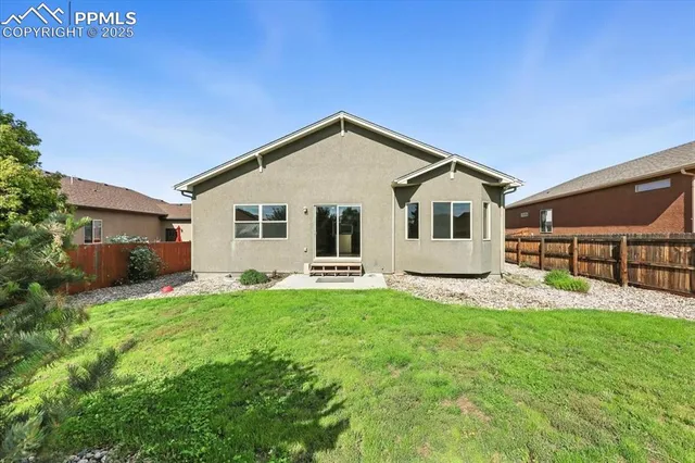 a house view with a garden space