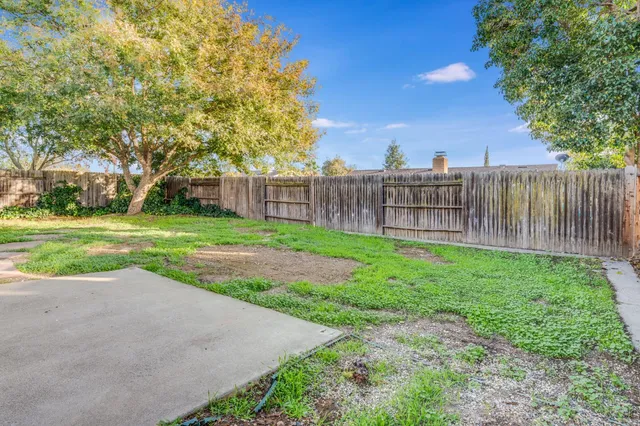 a view of a backyard with a garden