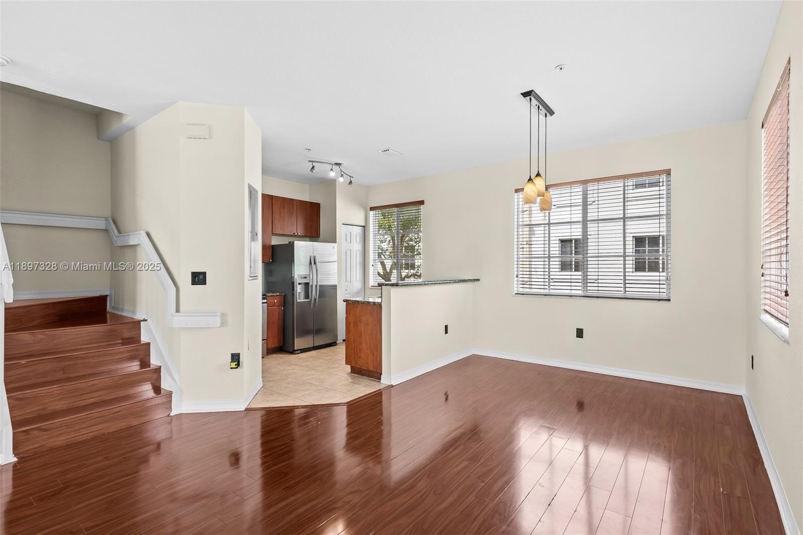 12421 Southwest 50th Court, Unit 347 Miramar, FL 33027 - Photo 16 of 25 a view of empty room with wooden floor