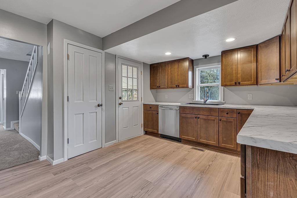 589 Pine Run Road Freedom, PA 15042 - Photo 11 of 29 a view of a kitchen with a sink and a refrigerator