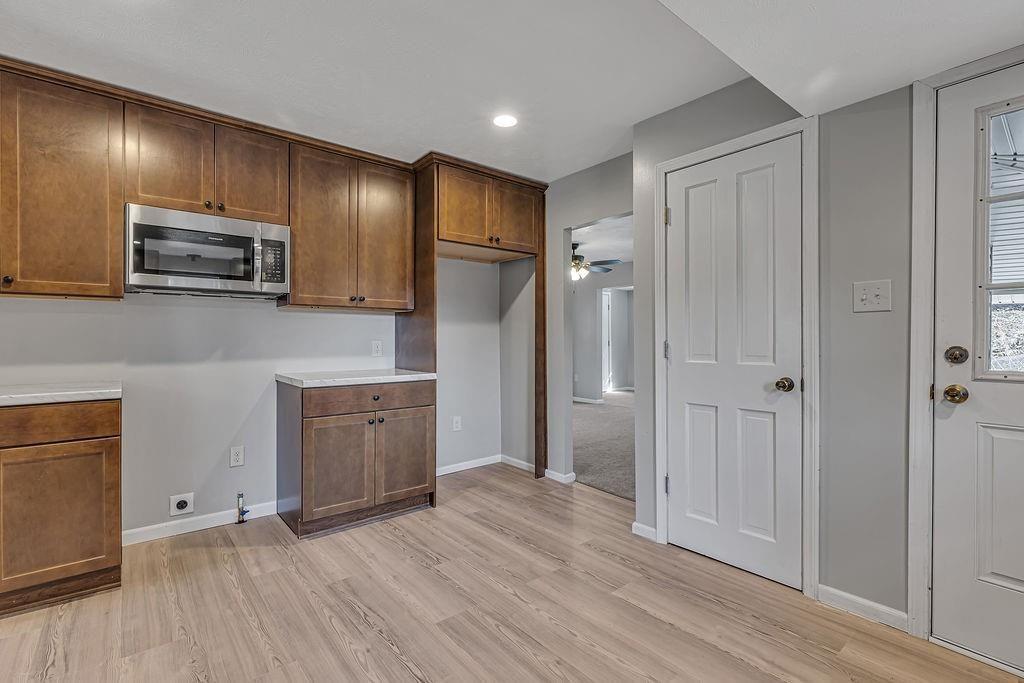 589 Pine Run Road Freedom, PA 15042 - Photo 14 of 29 a view of a kitchen with a sink and a refrigerator