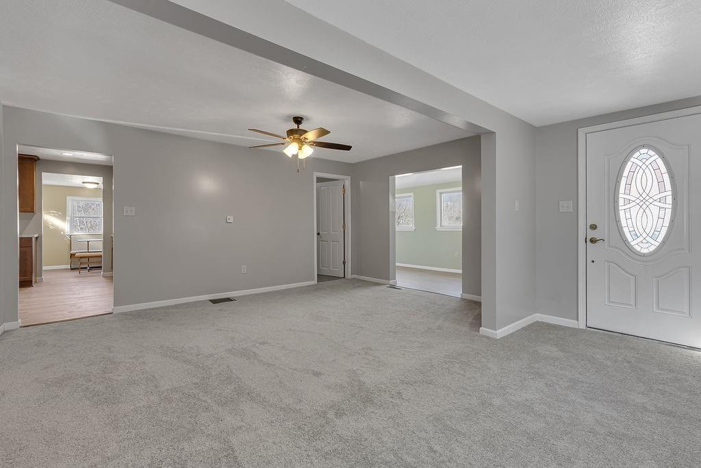 589 Pine Run Road Freedom, PA 15042 - Photo 16 of 29 a view of a room with a chandelier fan and windows