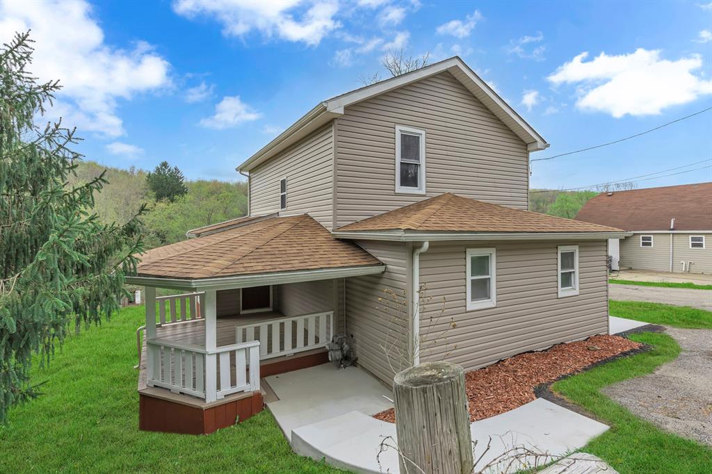 589 Pine Run Road Freedom, PA 15042 - Photo 3 of 29 a view of a house with a yard and sitting area