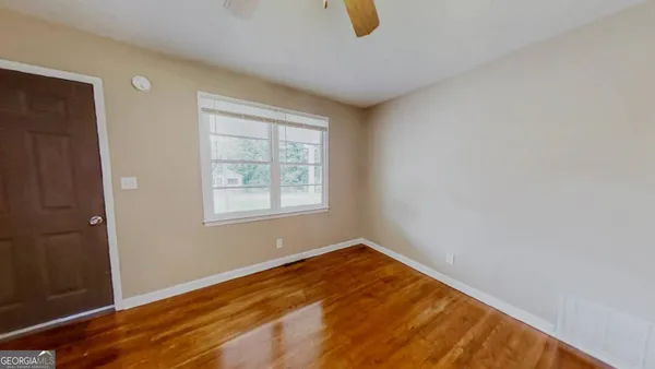 an empty room with windows