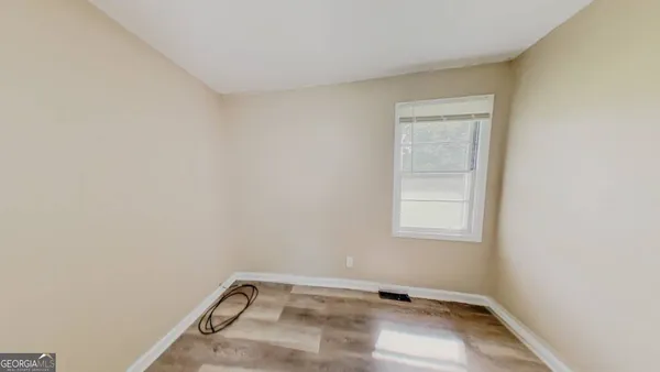 an empty room with a window
