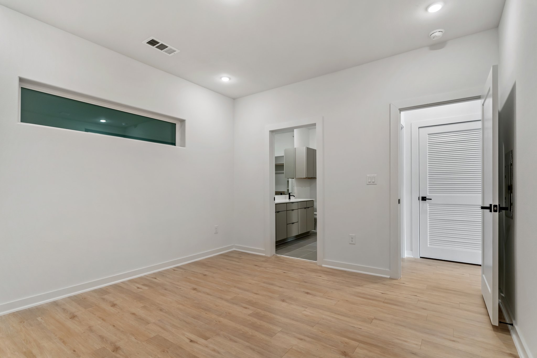 100 West Mockingbird Lane Austin, TX 78745 - Photo 15 of 24 a view of empty room with wooden floor