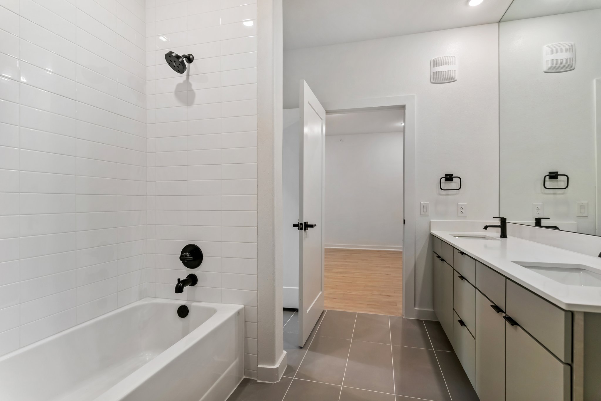 100 West Mockingbird Lane Austin, TX 78745 - Photo 17 of 24 a bathroom with a tub sink shower and mirror