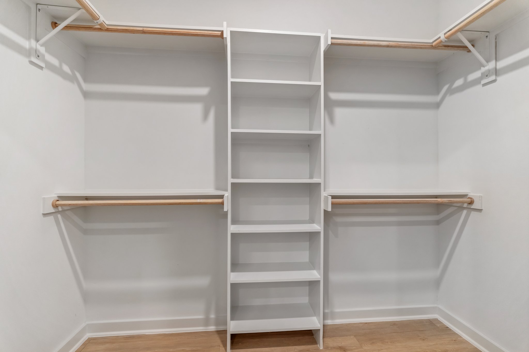 100 West Mockingbird Lane Austin, TX 78745 - Photo 18 of 24 a view of walk in closet with empty racks
