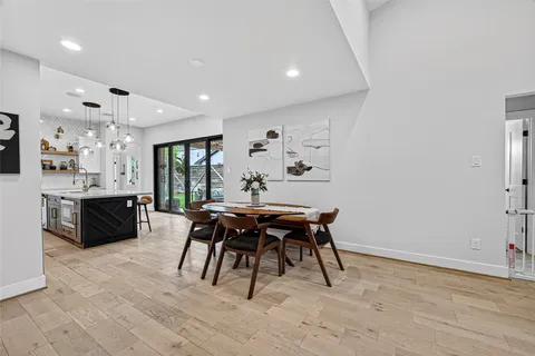 a livingroom with furniture and a gym cycle
