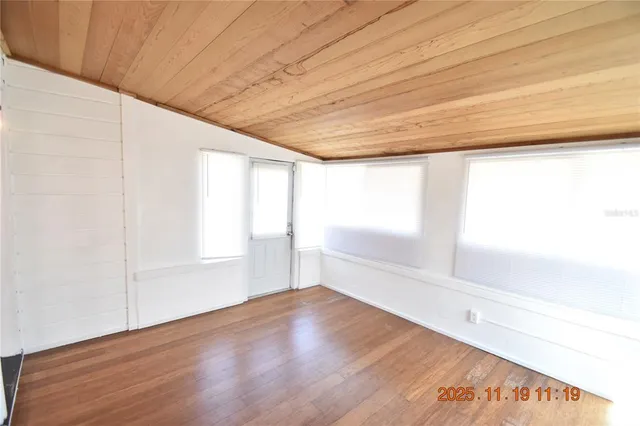 a view of an empty room and window