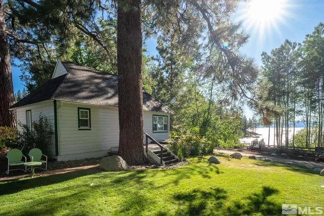 a swimming pool is sitting in the middle of a lake
