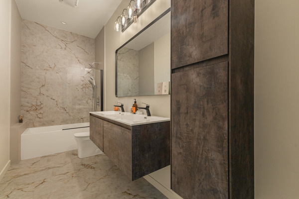 2135 West Cermak Road, Unit 3S Chicago, IL 60608 - Photo 8 of 14 a bathroom with a bathtub and a sink
