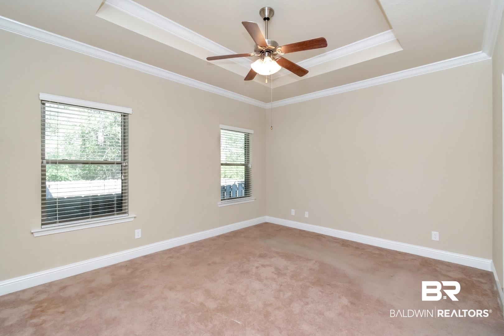6144 Whitebark Drive Mobile, AL 36693 - Photo 13 of 33 Spare room with a raised ceiling, crown molding, ceiling fan, and light colored carpet