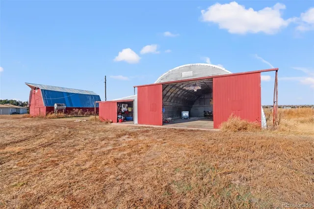 a view of a big room with a large window