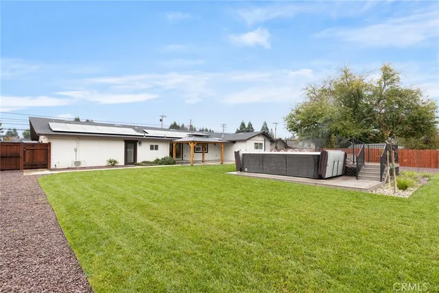 a house view with a garden space