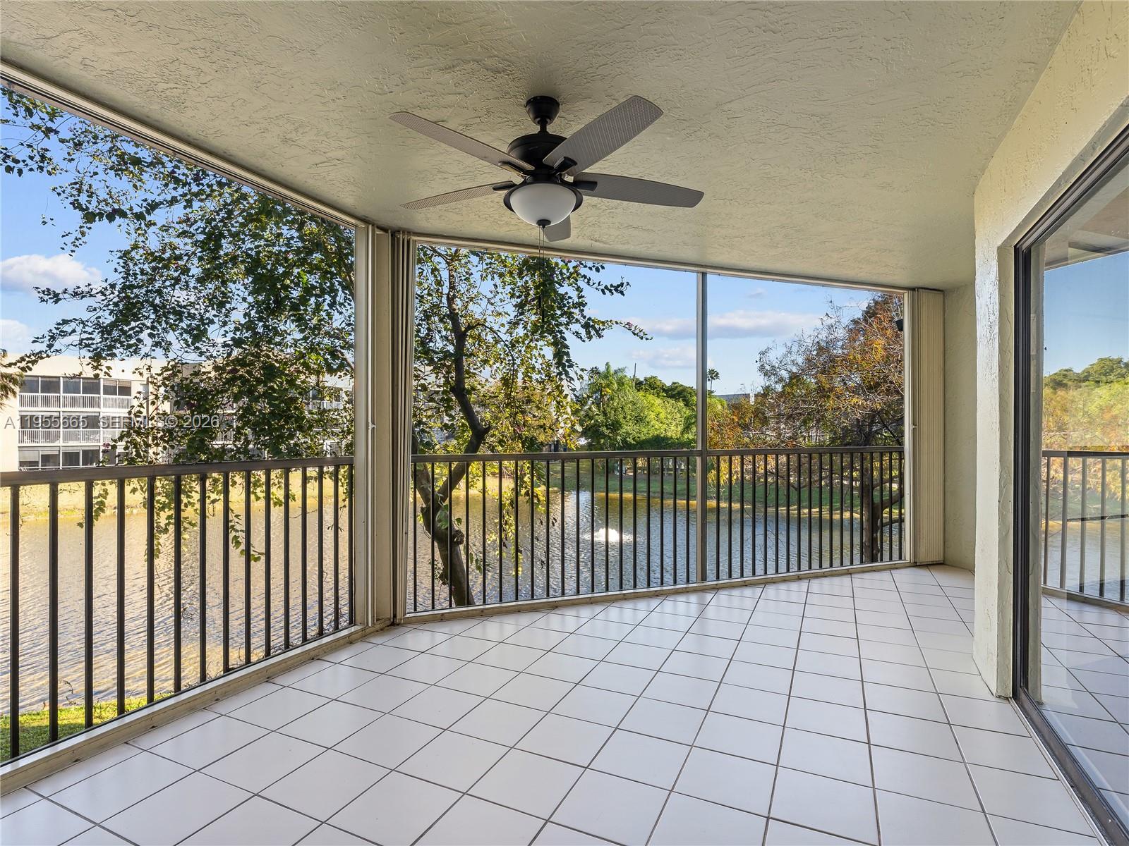 7547 Fairfax Drive, Unit 210 Tamarac, FL 33321 - Photo 28 of 38 a view of a porch