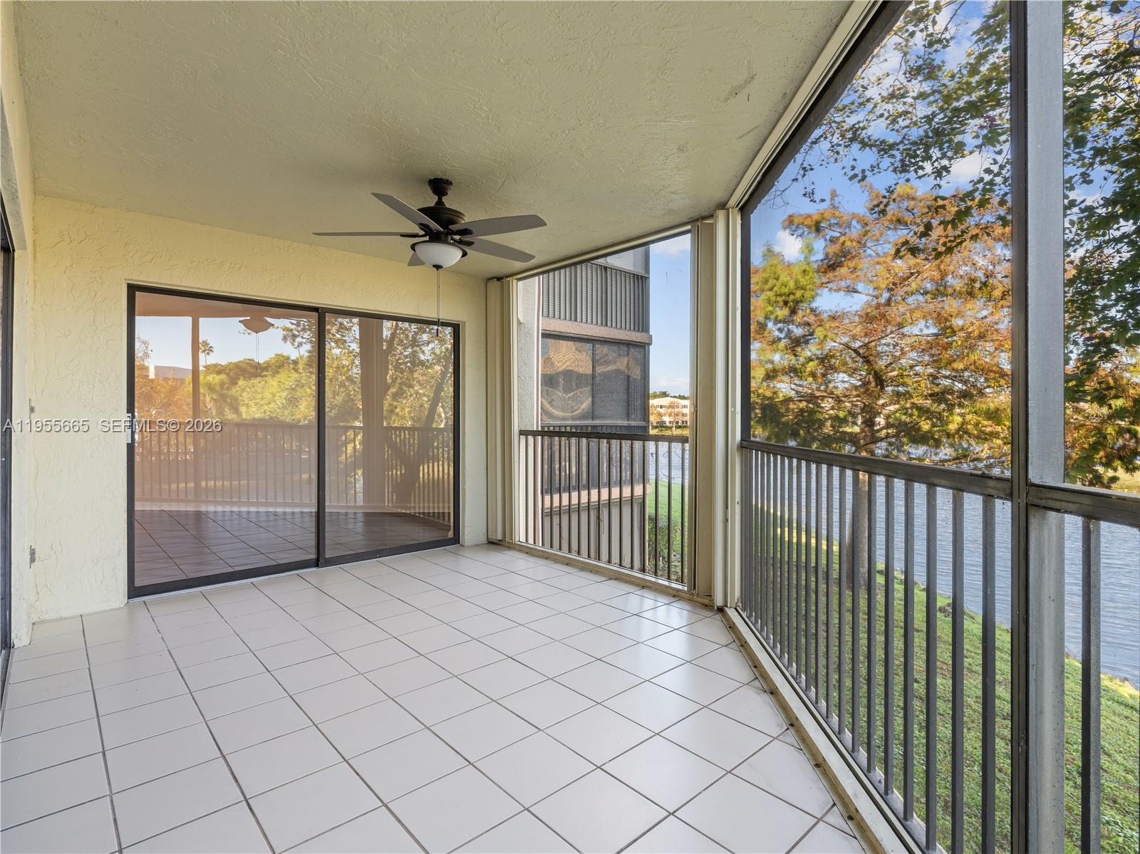 7547 Fairfax Drive, Unit 210 Tamarac, FL 33321 - Photo 29 of 38 a view of a room with windows