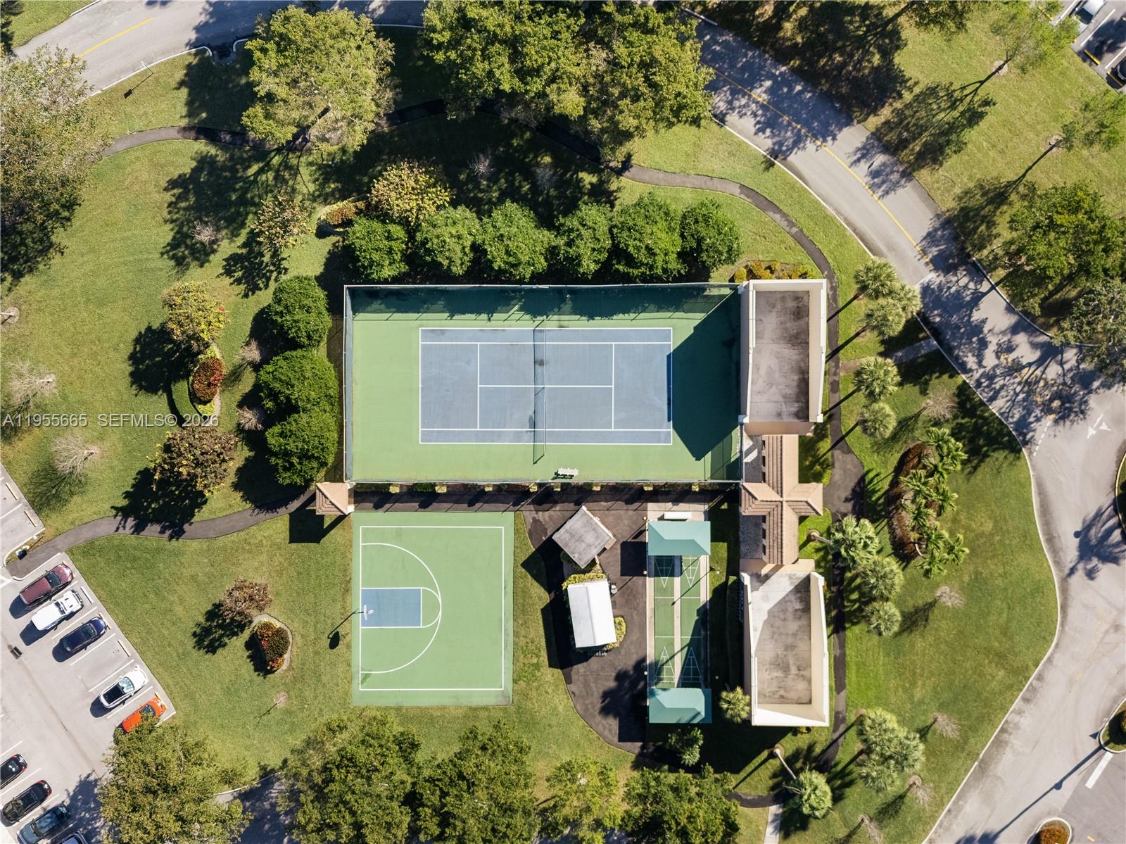 7547 Fairfax Drive, Unit 210 Tamarac, FL 33321 - Photo 35 of 38 an aerial view of a house with a yard