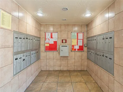 a bathroom with glass door shower